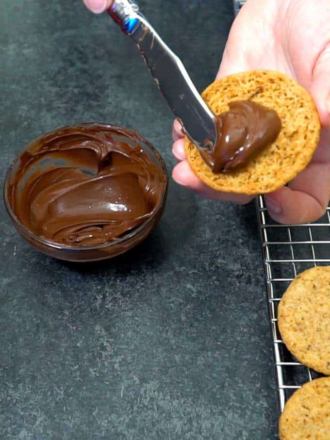 Spreading Chocolate on Cookies