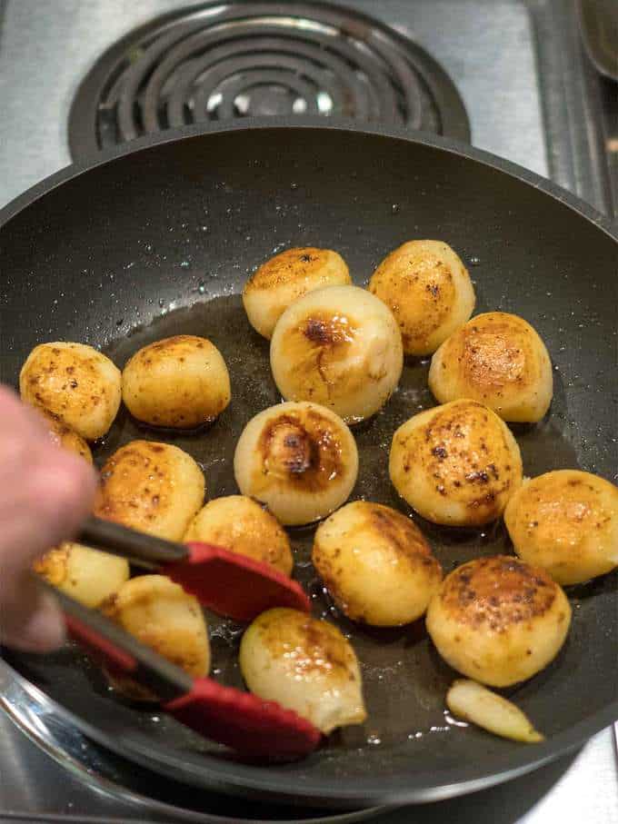 Turning the Roasted Potatoes and Onions