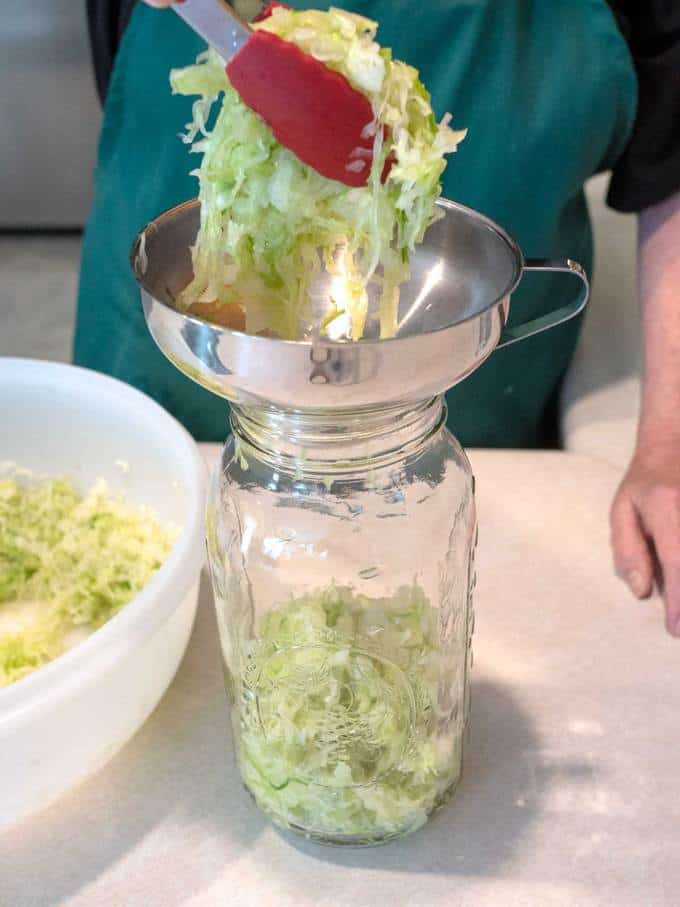 Adding the Cabbage to Mason Jar