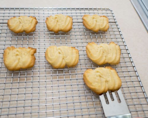 Transferring Viennese Sablés to cooling rack