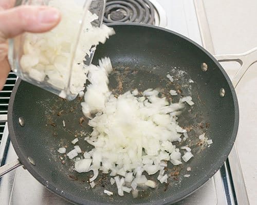 Adding onion to the Beef Stroganoff