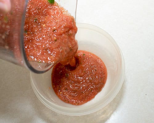 Transferring salsa to container