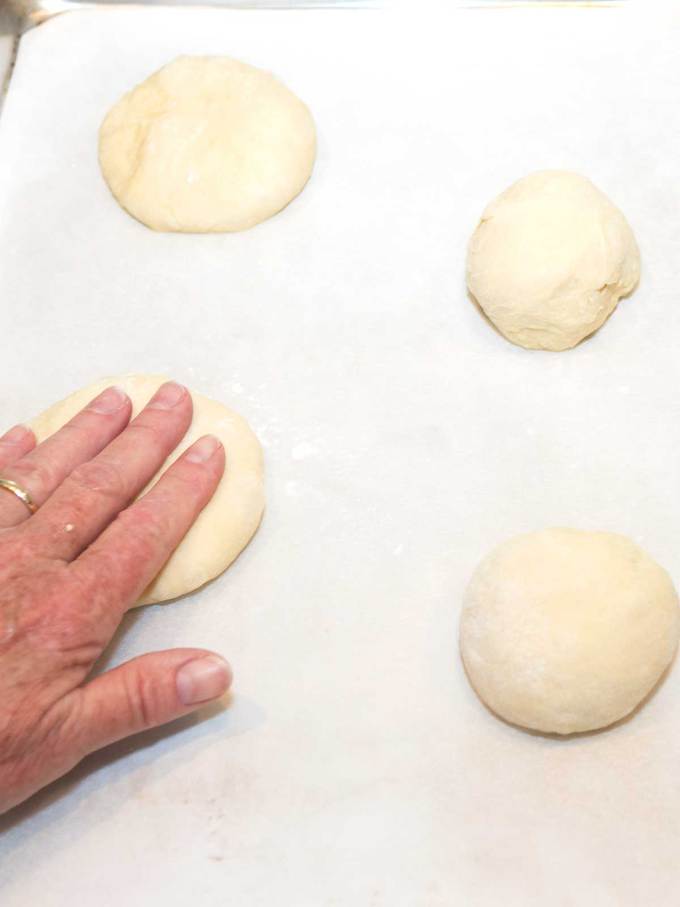 Flattening rolled dough