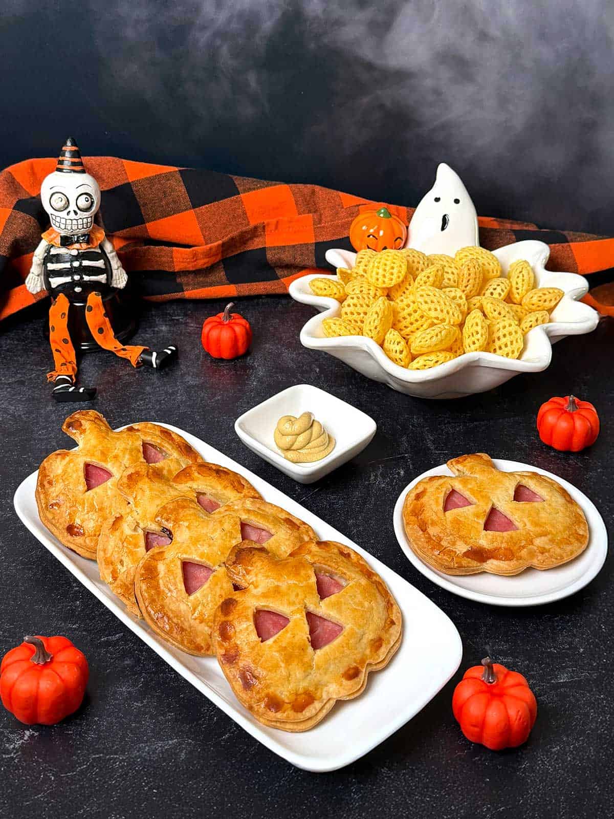 Halloween Ham and Swiss Hand Pies shaped like Jack O'Lanterns.