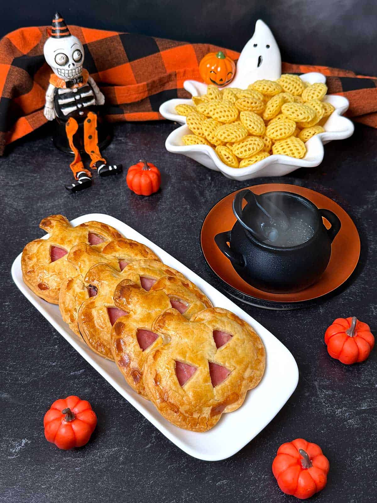 Jack O'Lantern Halloween Ham and Swiss Hand Pies.