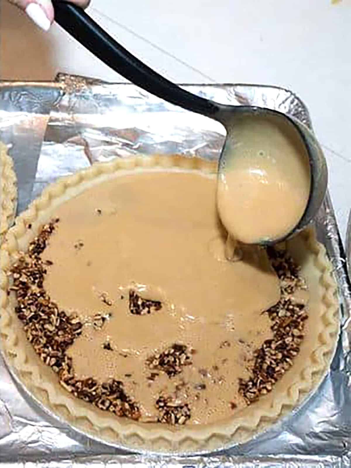 adding filling to pie shell