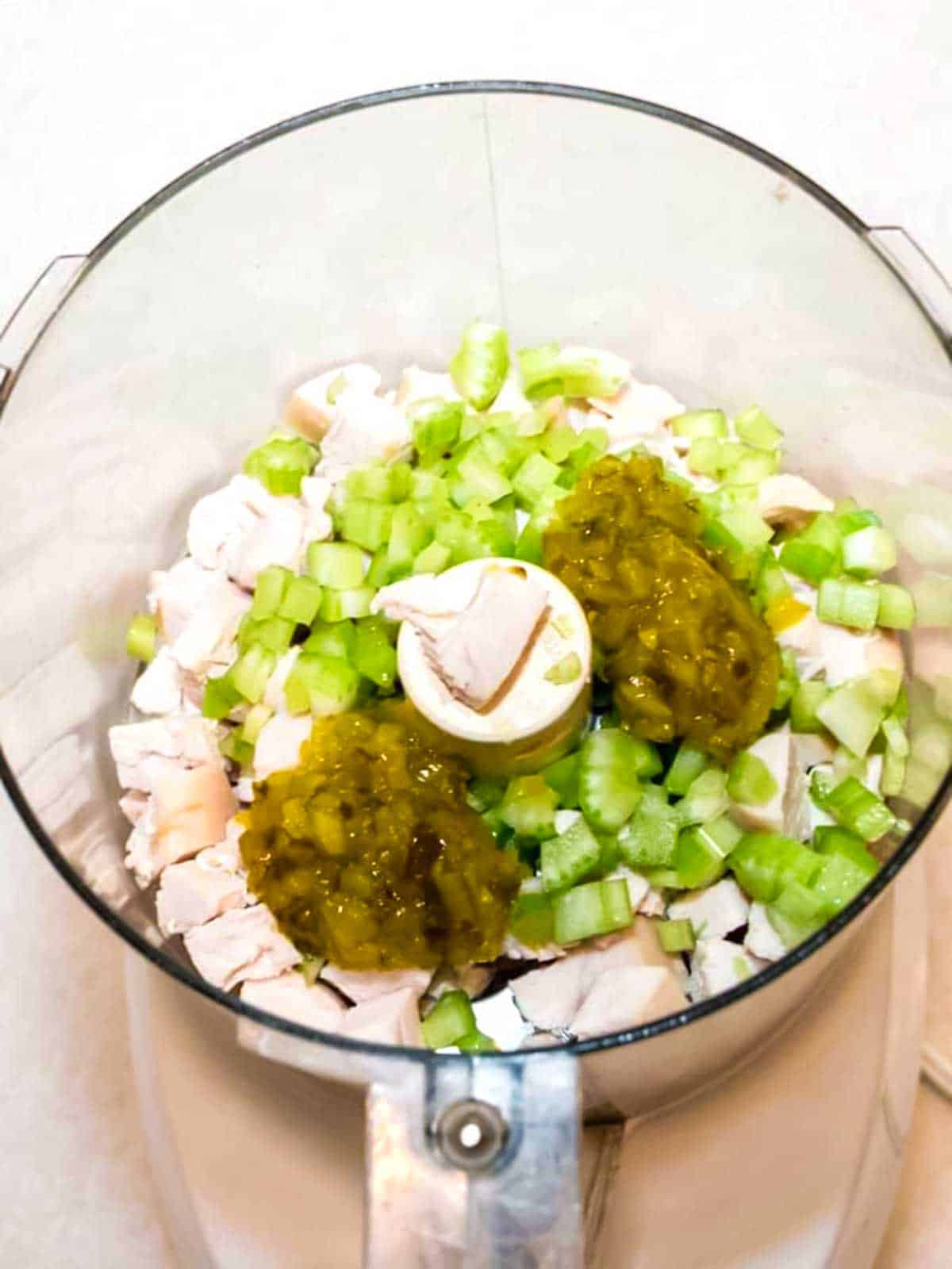 Turkey salad ingredients in food processor.