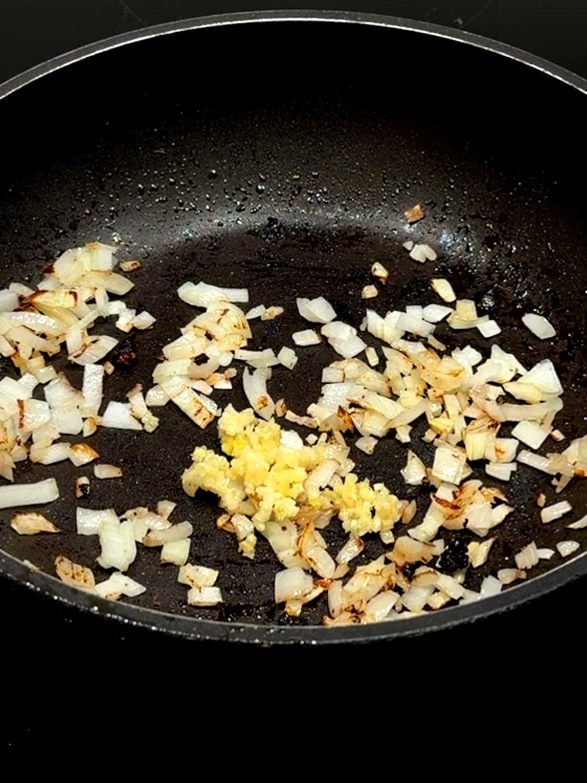 Garlic added to the onlons.