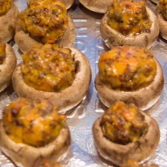 Sausage n'Cheese Stuffed Mushrooms - watch them fly off the plate.
