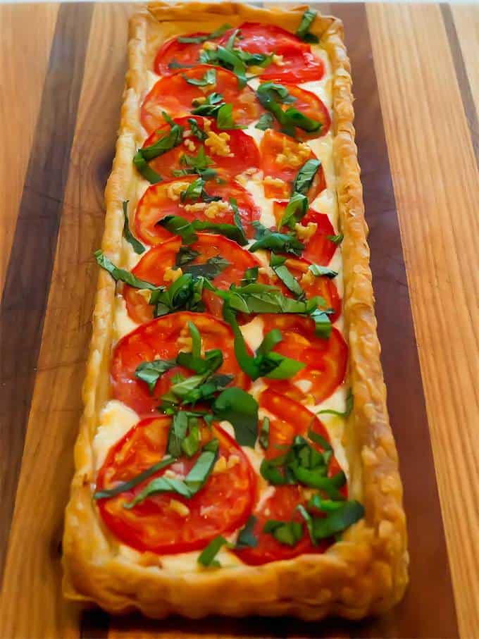 Fresh tomatoes in a creamy base with puff pastry crust