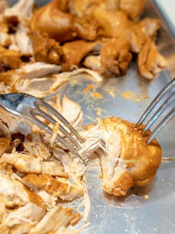 Shredding the chicken for Instant Pot Pulled Chicken Sliders