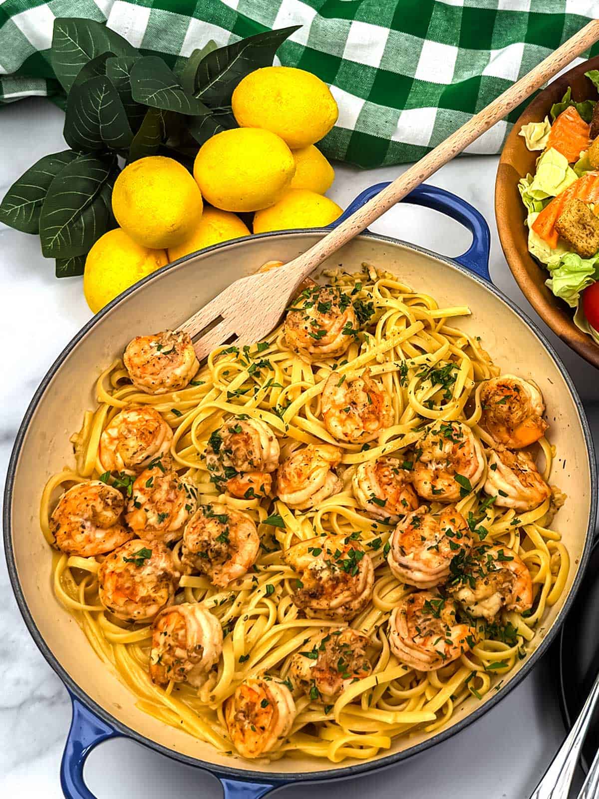 Shrimp scampi over linguine.