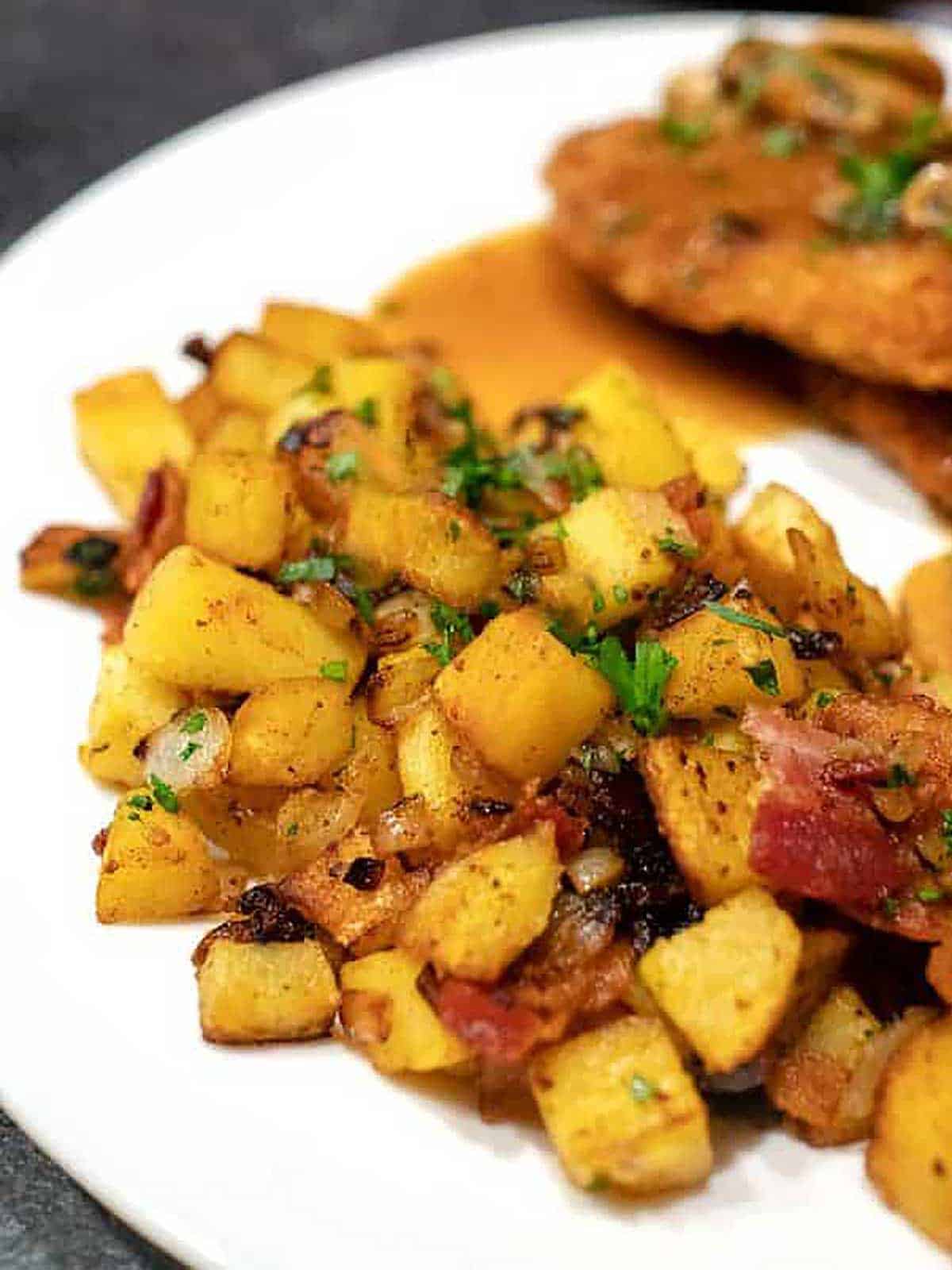 German fried potateos with onions and bacon.