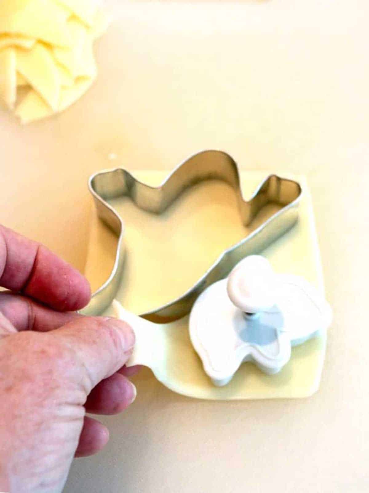 Making the Ghost Shapes from sliced mozzrella cheese.