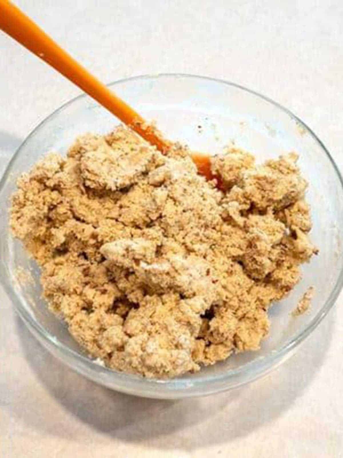 Fiinal pecan sandies cookie dough in bowl.