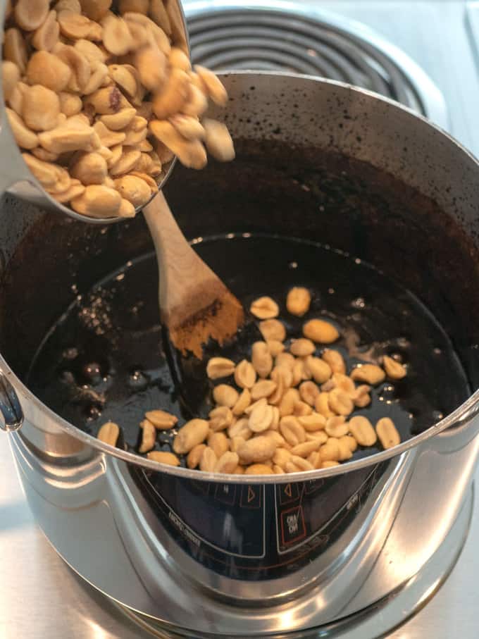 Adding Peanuts to Old-Fashioned Chocolate Fudge Mixture