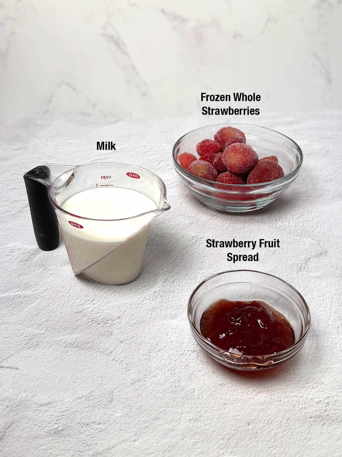 Ingredients for strawberry smoothie.