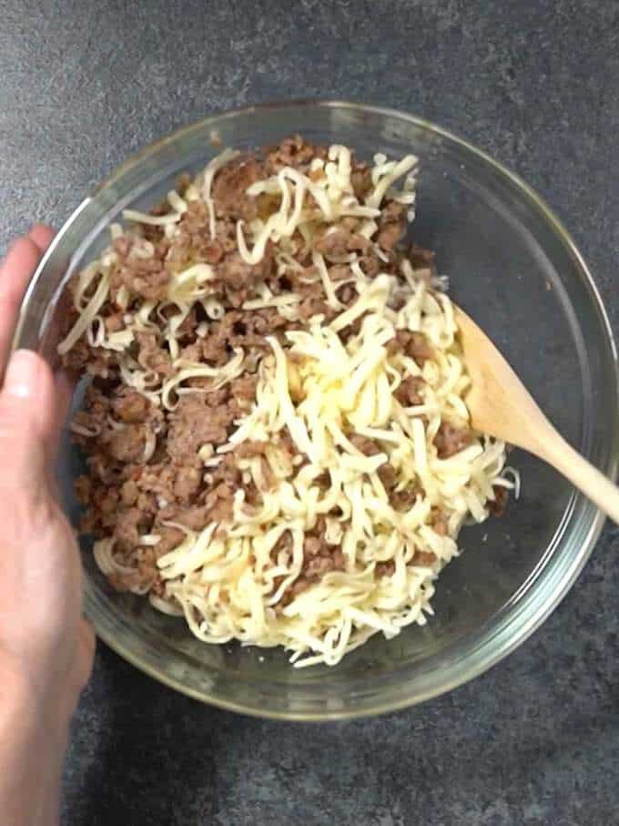 Mixing Cheese and Sausage Together