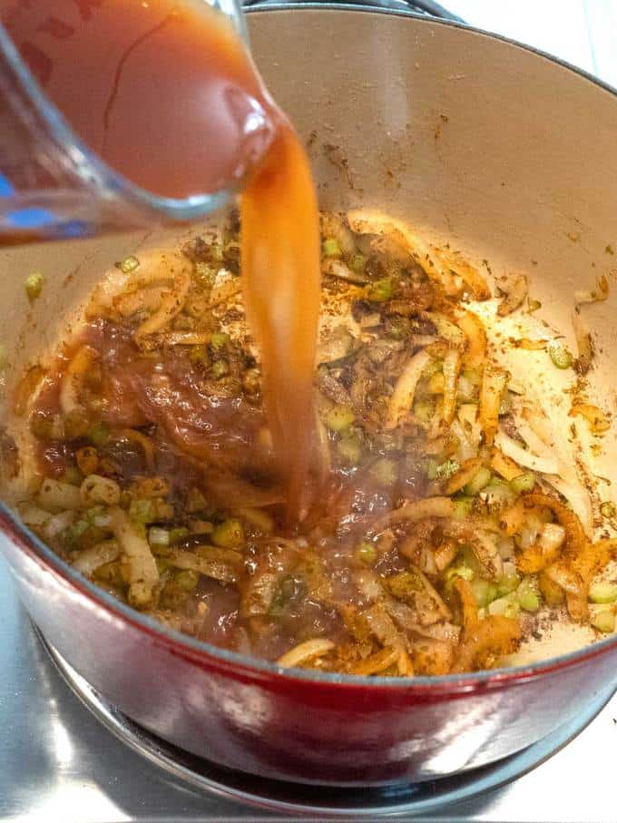 Adding Beef Broth mixture to vegetables in Dutch oven