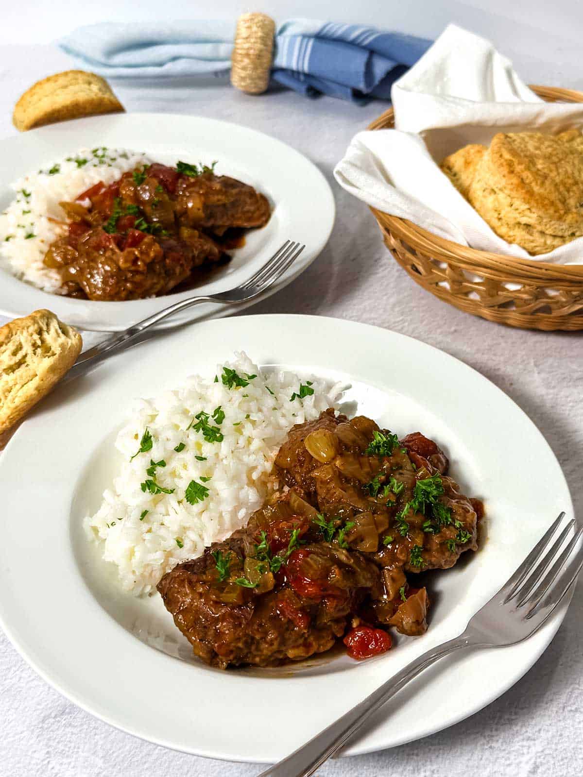 Classic Swiss Steak with rice and biscuits.