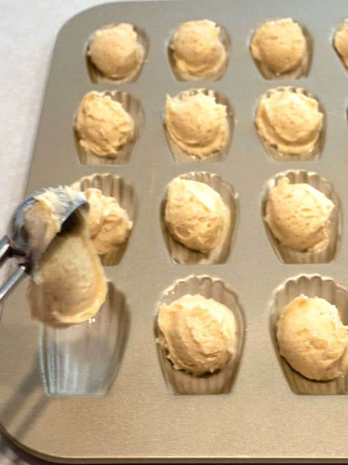 Adding batter to pan for Julia Child's Madeleines