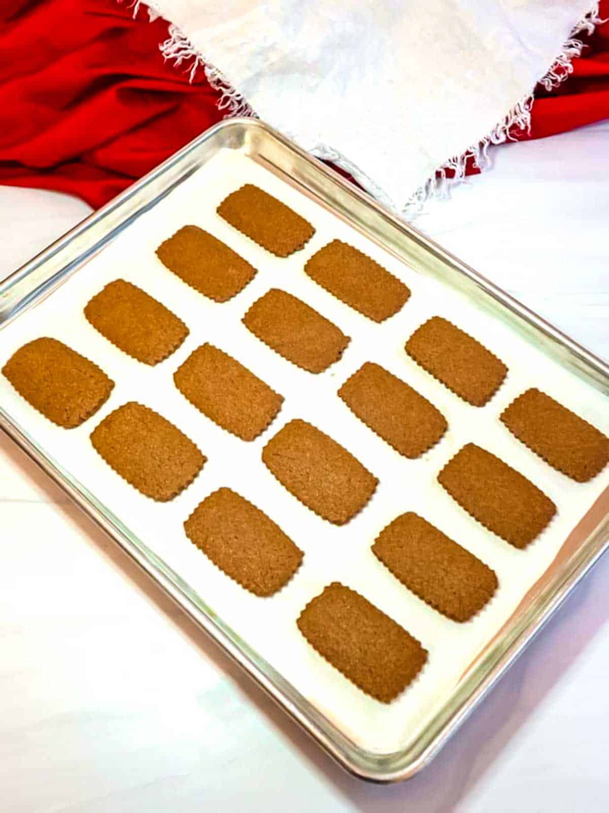 Belgian spice cookies cooling on the pan.