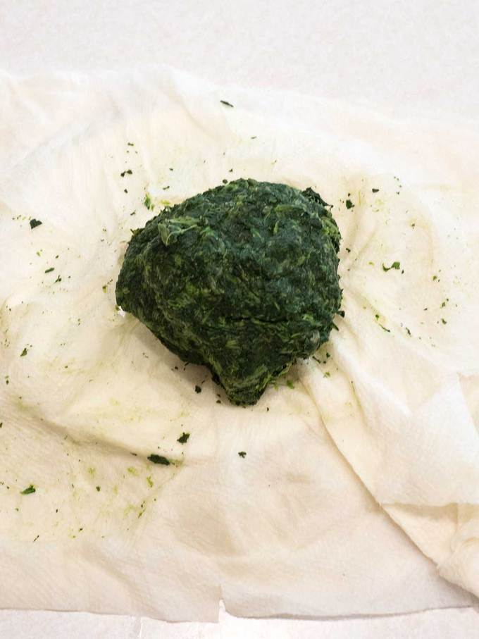 Thawed frozen spinach squeezed in paper towels