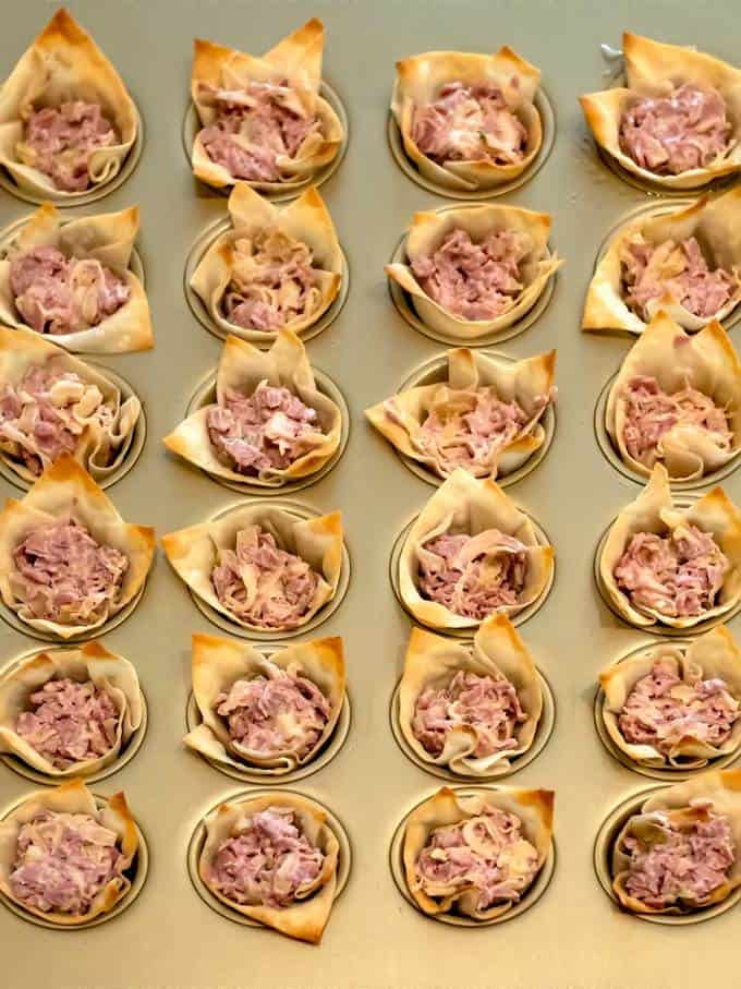 Wonton cups filled with corned beef mixture