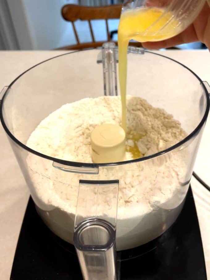 Adding butter to food processor