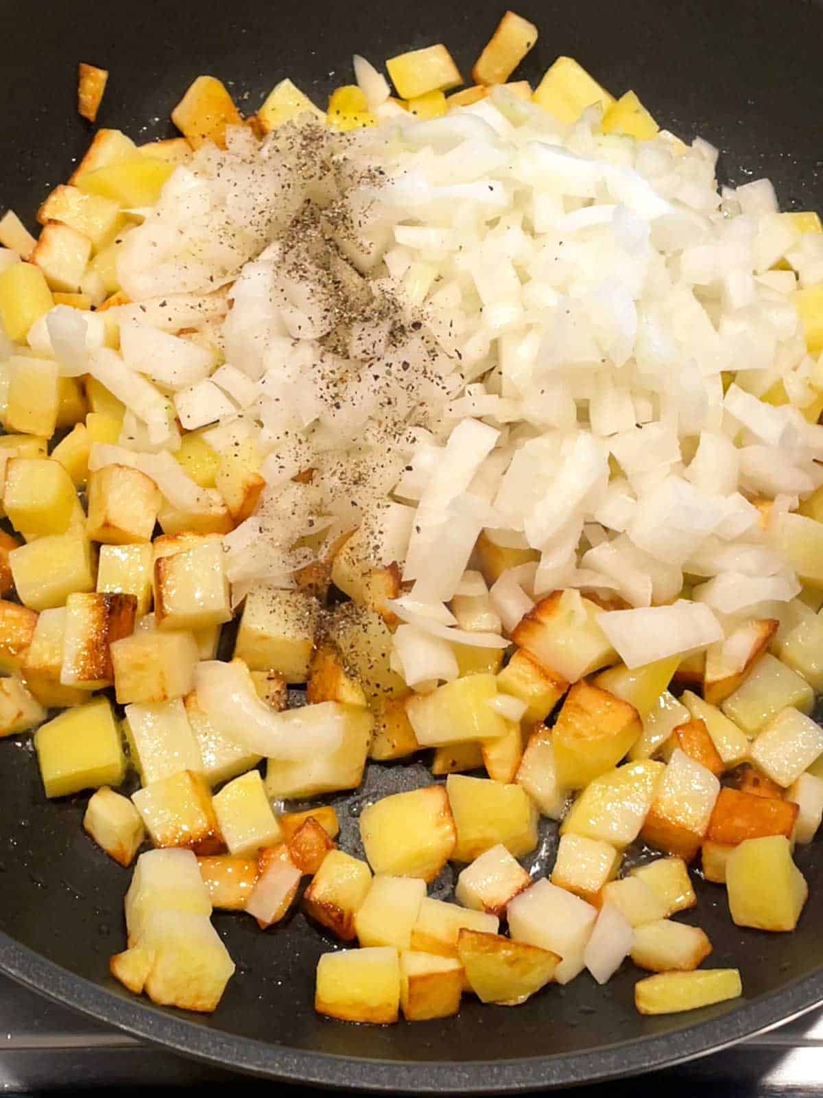 Potatoes with onions and pepper added.