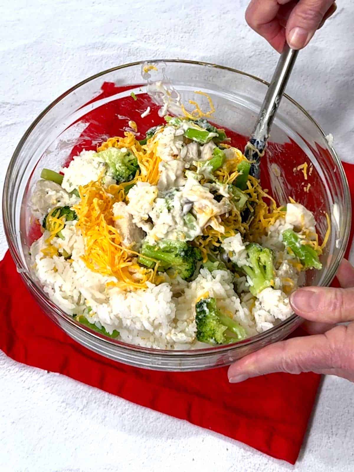 Stirring all of the ingredients together.