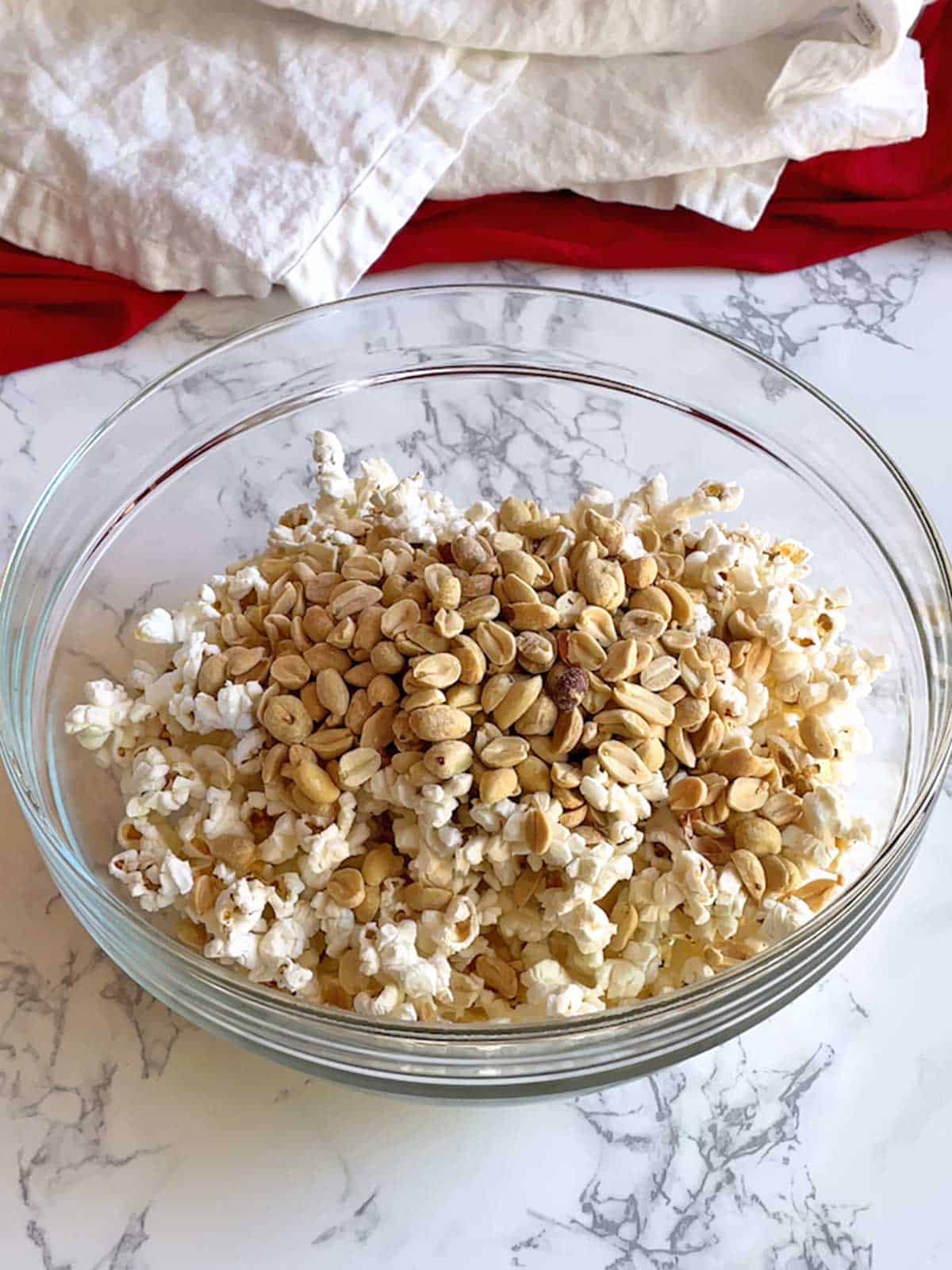 Popcorn and peanuts in large bowl.