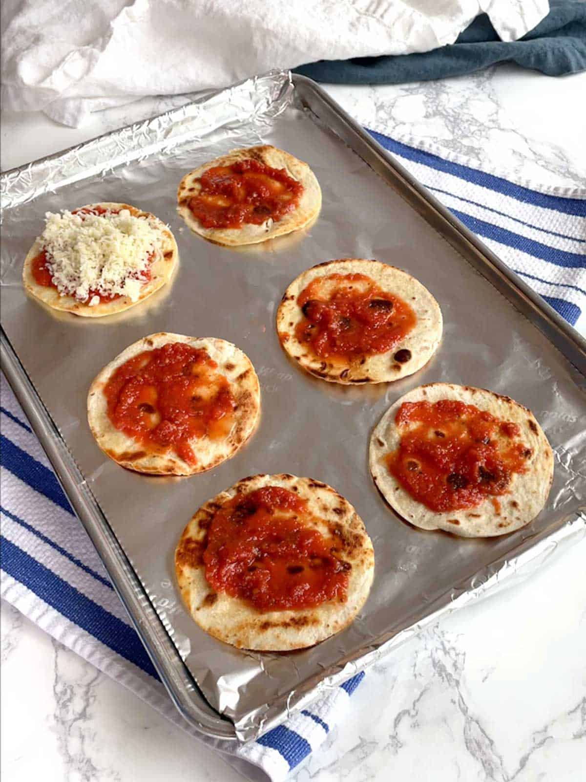 Mini Pizzas ready for oven