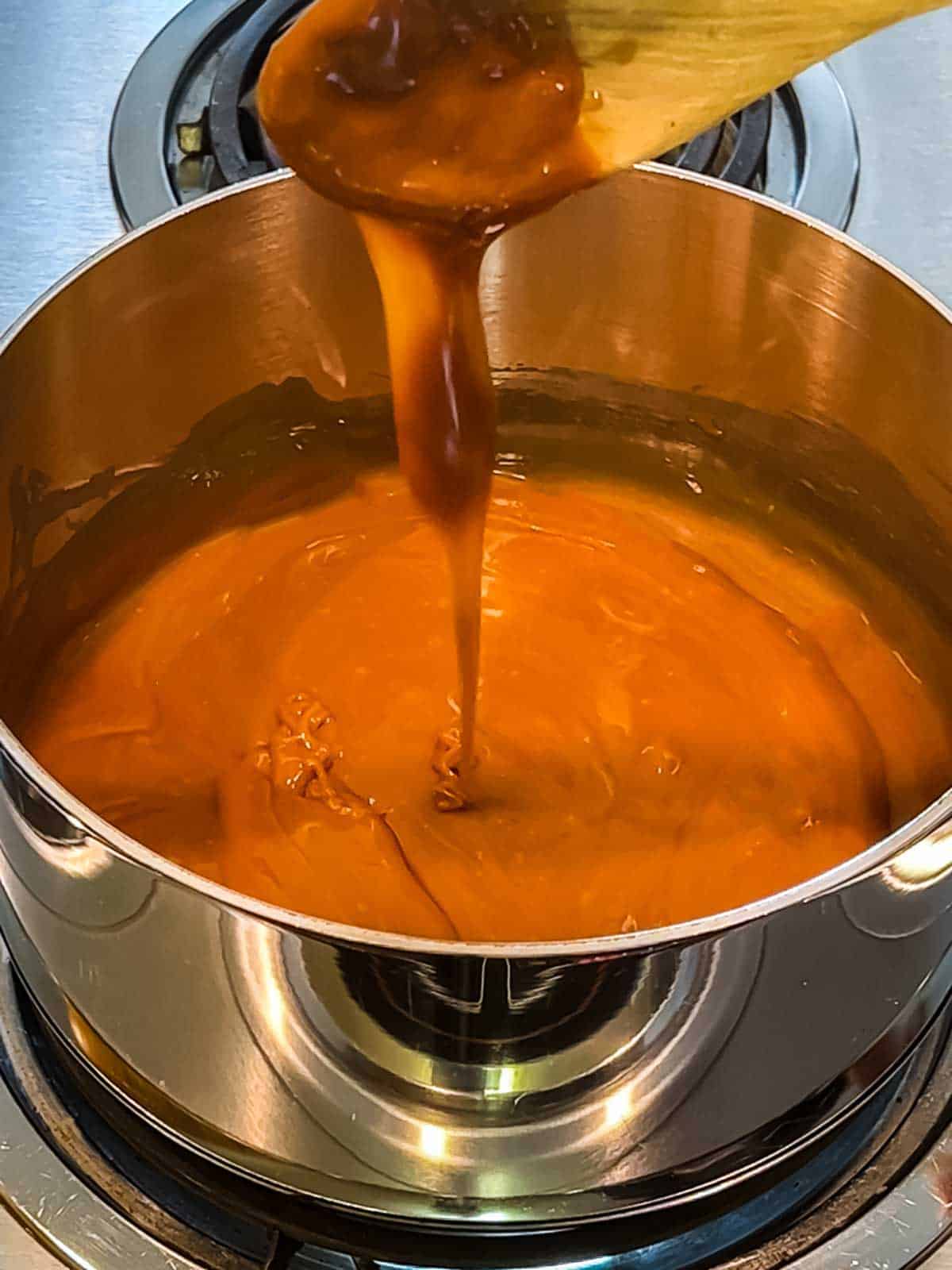 Melted Caramel bits with water.