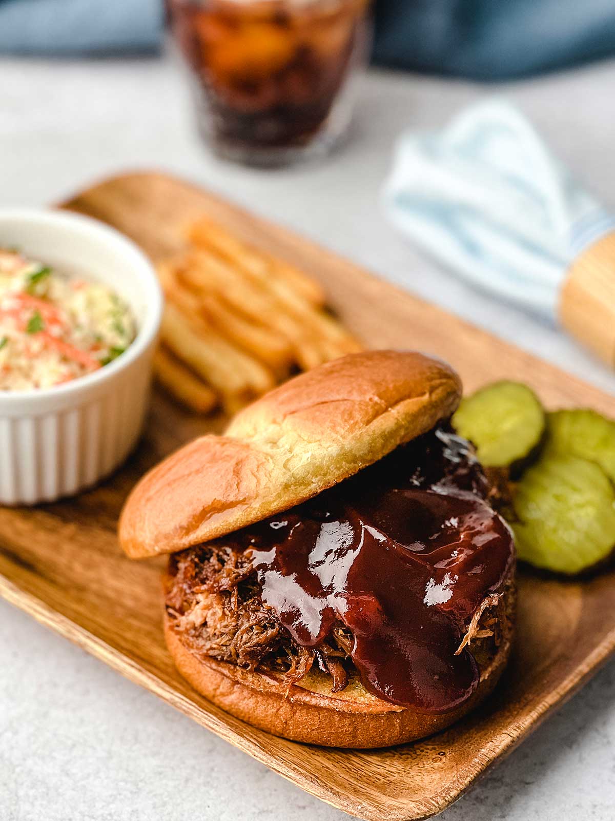 Pulled pork on a bun with barbecue sauce.