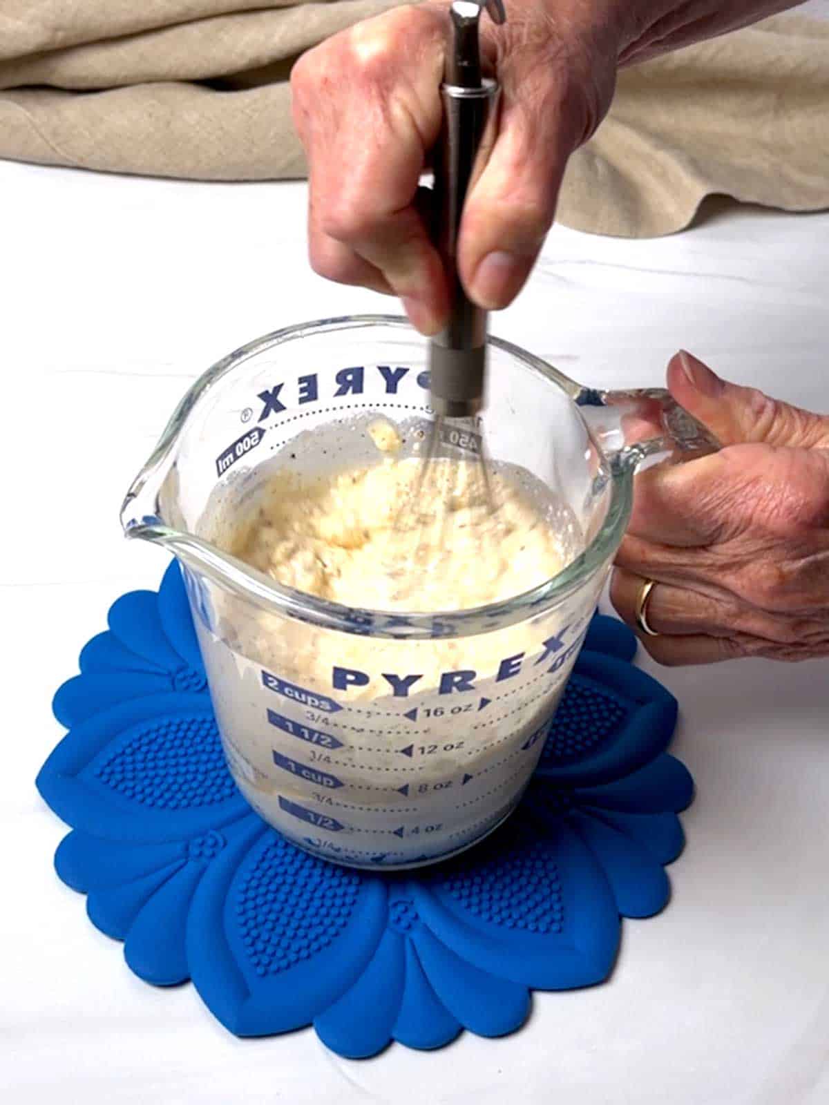 Whisking_dressing for the coleslaw.