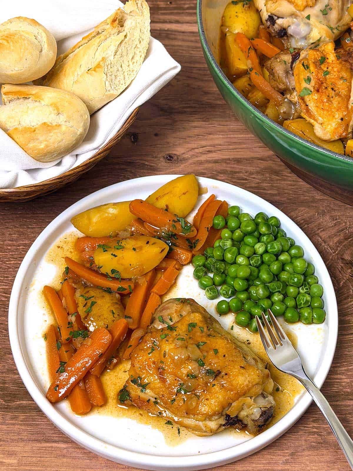 Braised chicken thighs with veggies.