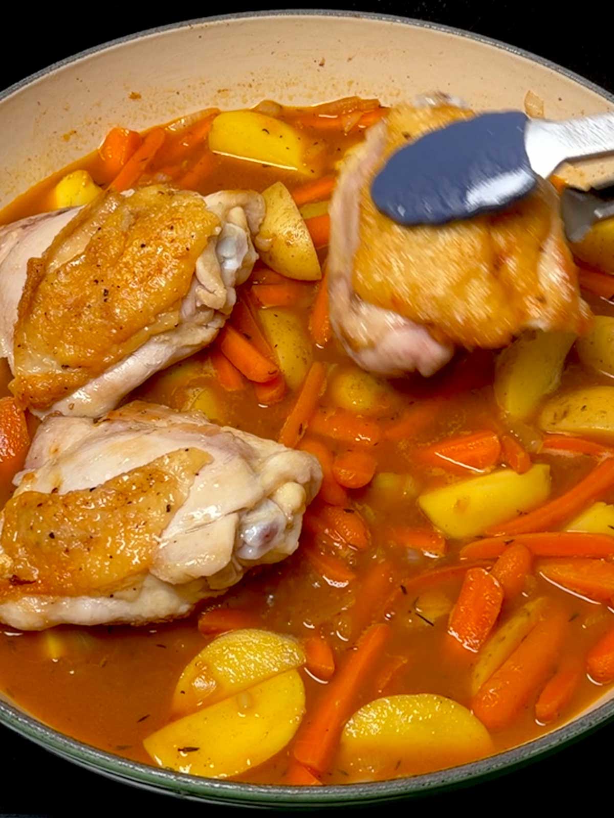 Adding chicken back to the braisewr.