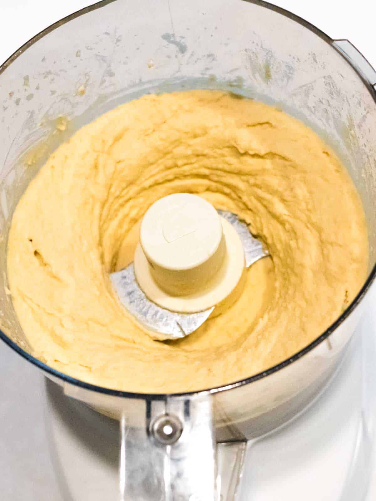 Processed Hummus in food processor.