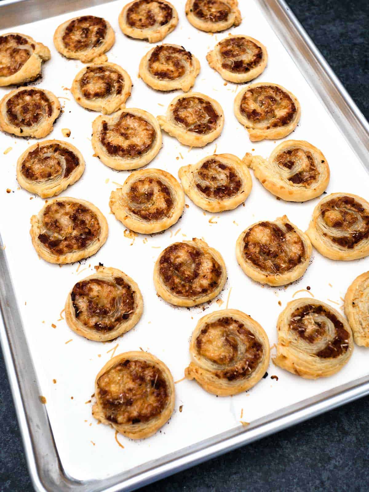 Ham and cheese pinwheels out of oven.