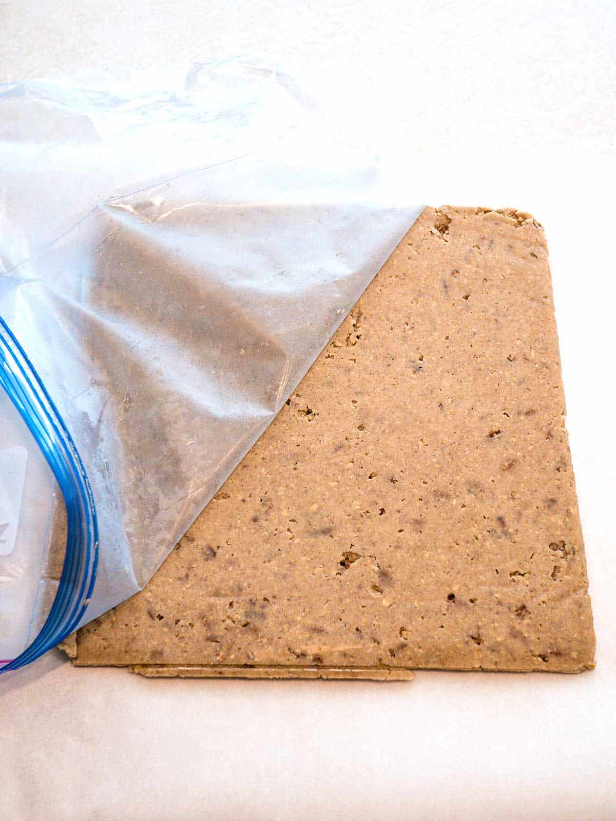 Removing Ziploc bag from the cookie dough.