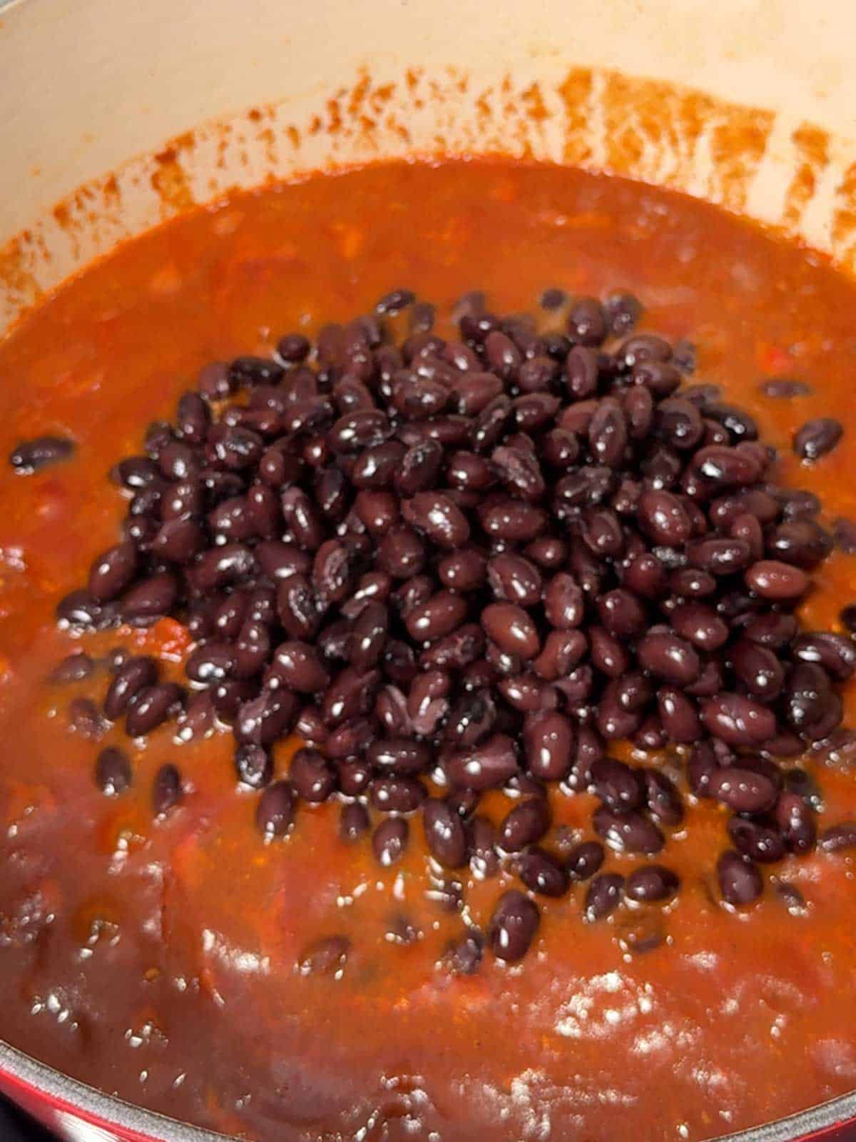 Black beans added to the chili.
