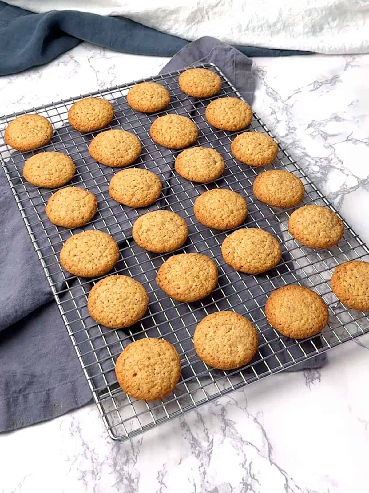 Cookies cooling on a wire rack.