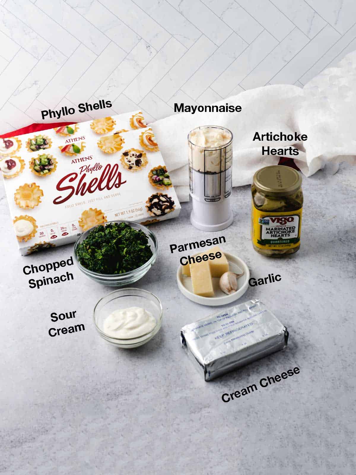 Ingredients for make ahead spinach artichoke tartlets