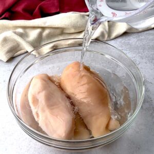 Adding Brine to chicken.