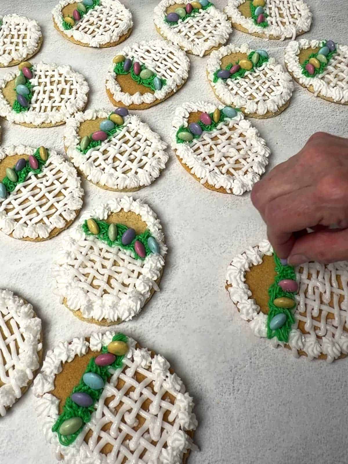 Adding M&Ms for the eggs.