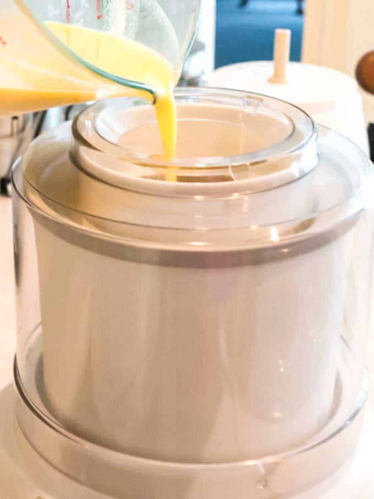 Pouring sherbet mixture into ice cream maker.