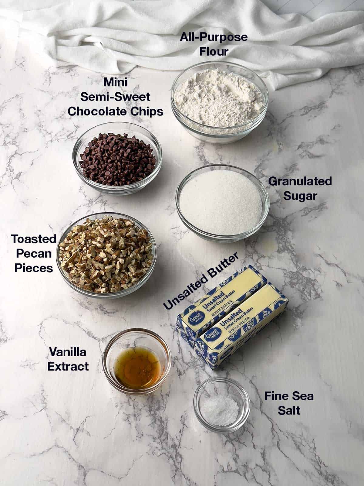 Ingredients for chocolate chip and pecan cookie brittle.