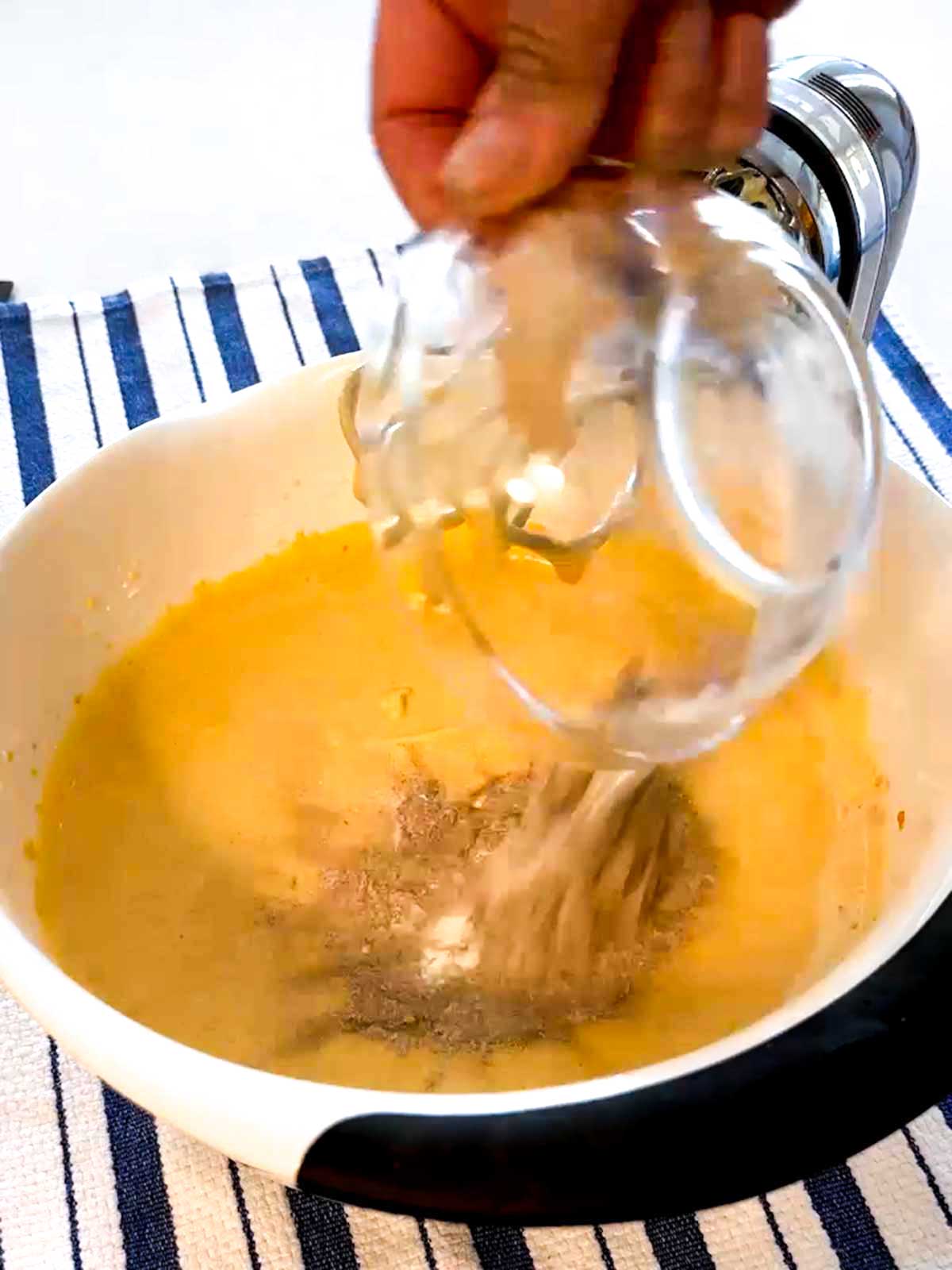 Adding spice mix to the pupkin cheesecake filling.