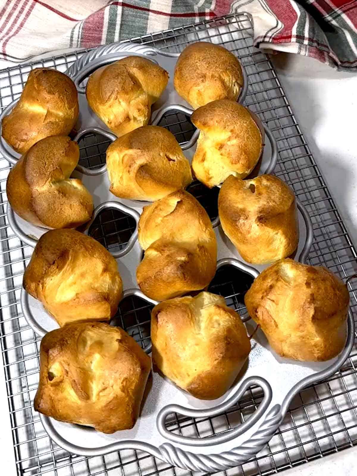 Mini popovers out of the oven still in the pan.